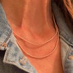 Handmade glass seed bead necklace layered on neckline, Seed and Soul artistry jewelry