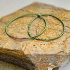 Handmade green glass seed bead bracelets on stone, Seed and Soul artistry jewelry