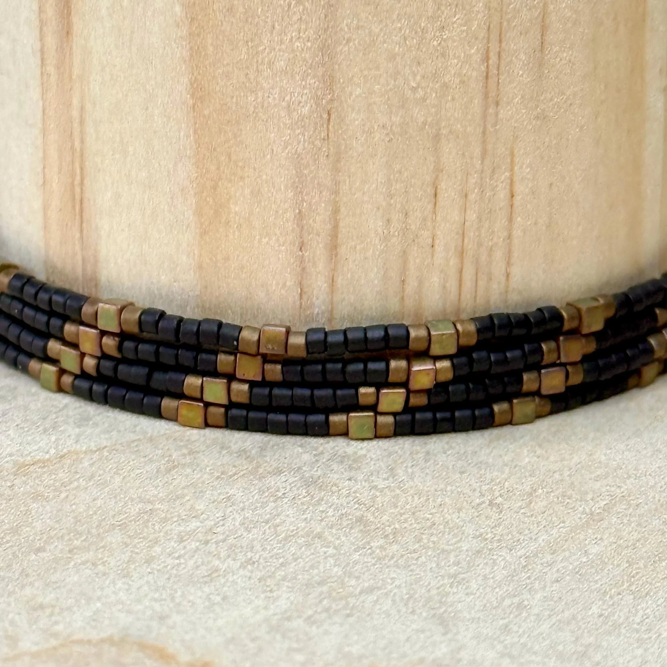 Handmade glass seed bead necklace with black and bronze square beads by Seed and Soul artistry