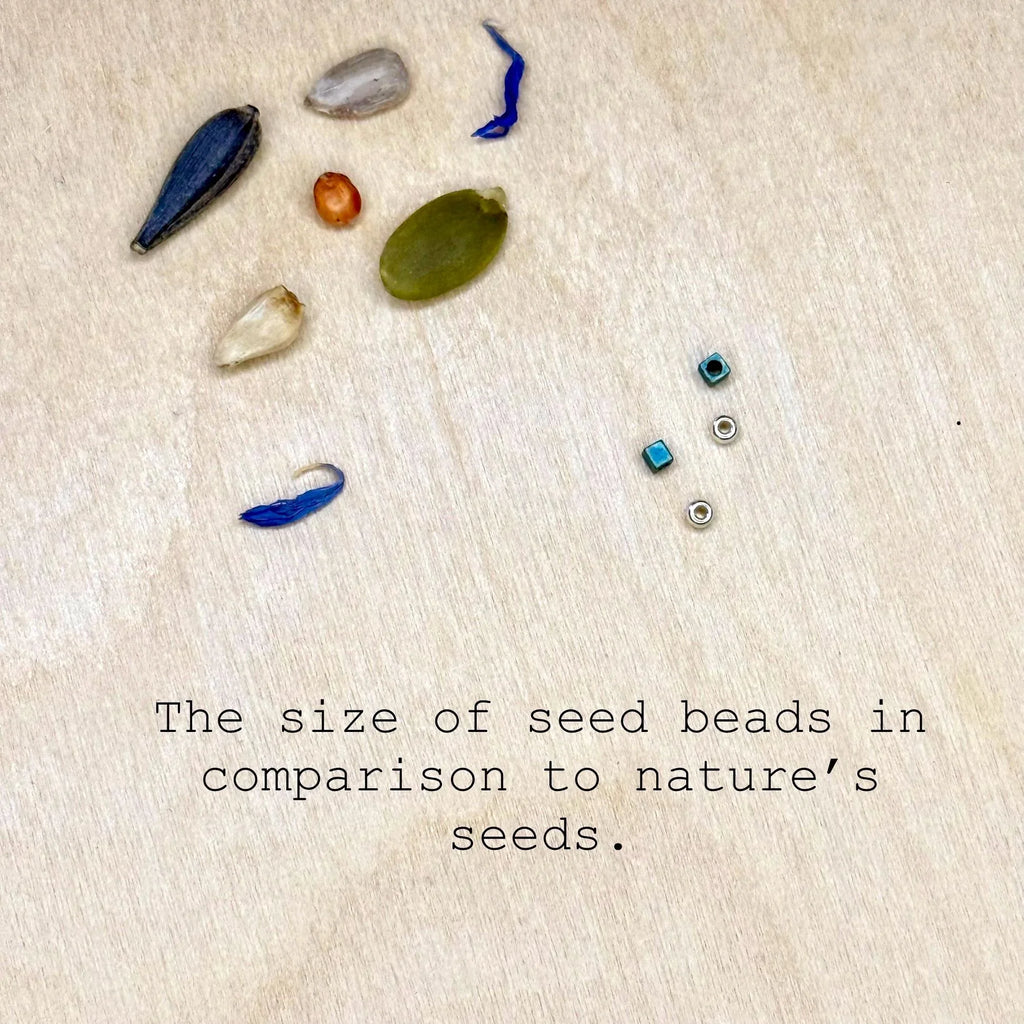 Glass seed beads and natural seeds on wood with comparison text, Seed and Soul artistry jewelry.