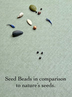 Glass seed beads and natural seeds on textured background, Seed and Soul artistry handmade jewelry