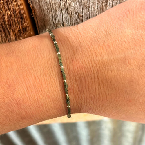 Handmade glass seed bead bracelet on wrist, Seed and Soul artistry jewelry USA