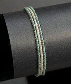 Handmade glass seed bead bracelet in soft blue and cream, Seed and Soul artistry jewelry
